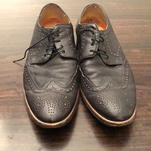 Cole Haan Worn Wingtip Oxford with toe medallion
